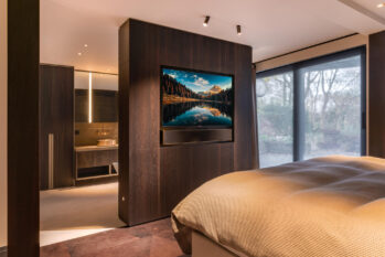 Slaapkamer met TV-meubel